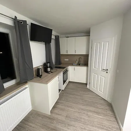 Апартаменты Appartementhaus Brunsholm Esgrus